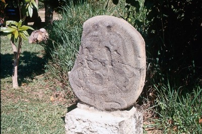 MONUMENTO 61, FIGURA HUMANA SENTADA