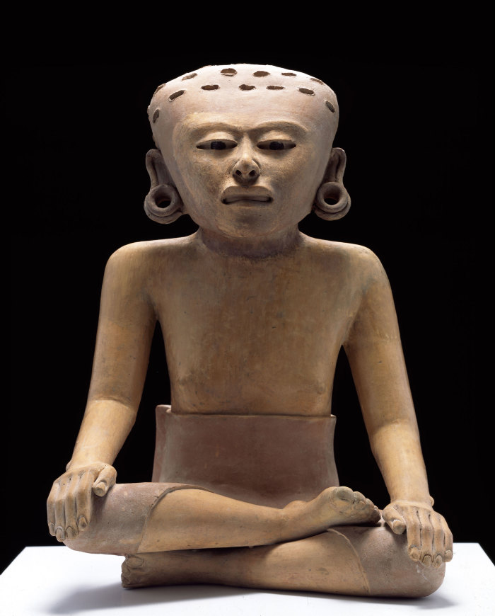 Figura femenina sedente