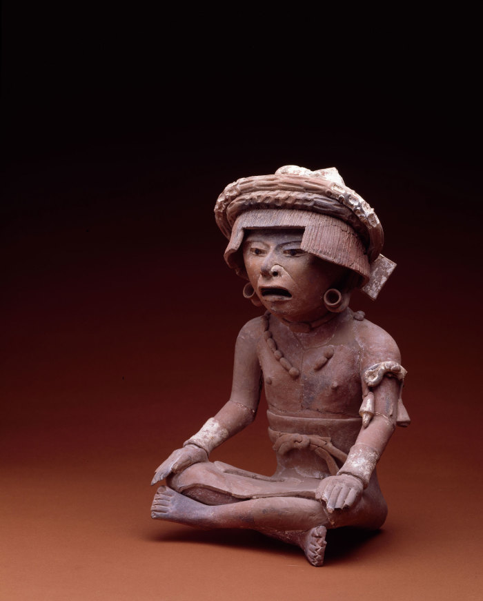 Figurilla masculina sedente