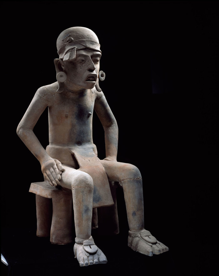 Personaje sedente