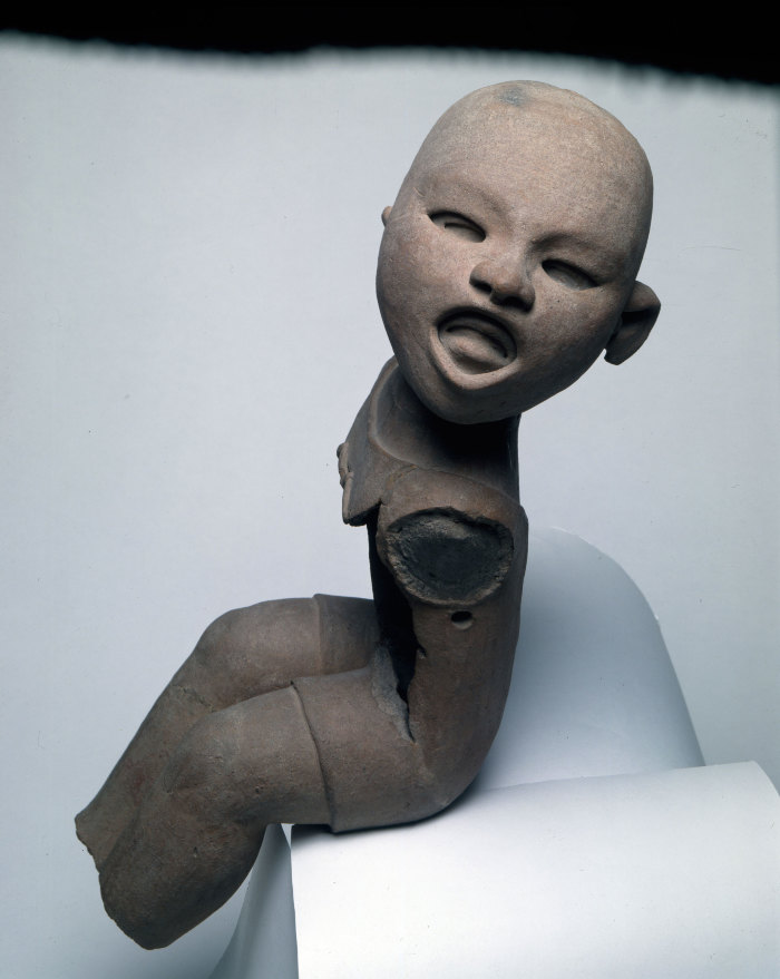 Joven con máscara devocional de Xipe - Totec