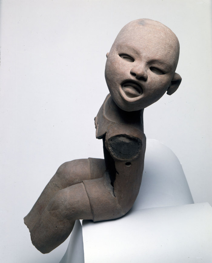 Joven con máscara devocional de Xipe - Totec