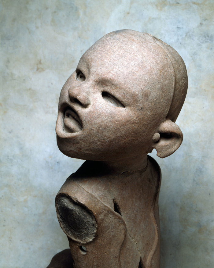 Joven con máscara devocional de Xipe - Totec