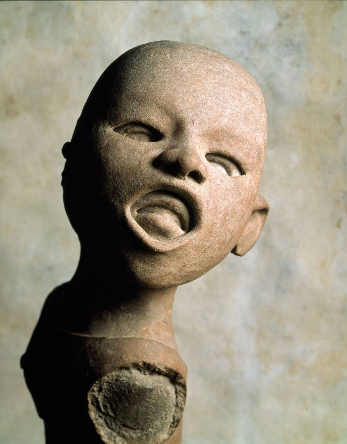 Joven con máscara devocional de Xipe - Totec