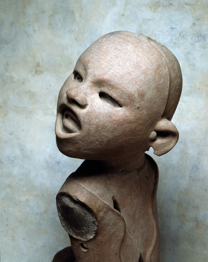 Joven con máscara devocional de Xipe - Totec