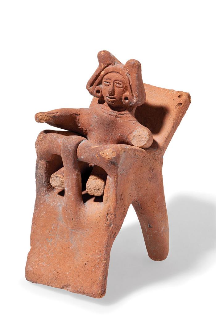 Figurilla antropomorfa de infante en silla periquera