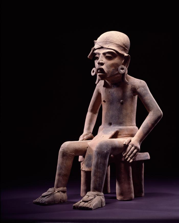 Personaje sedente